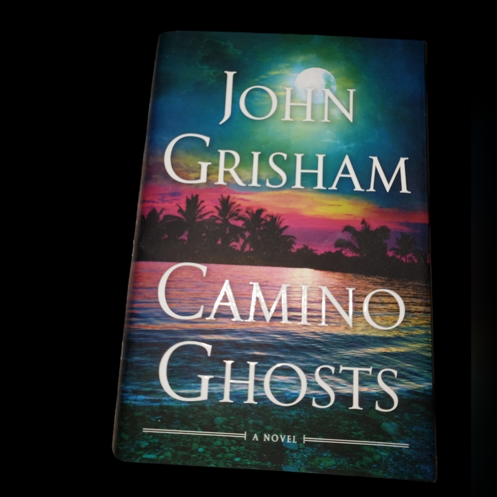 Book- John Grisham- Camino Ghosts. EUC! 💙